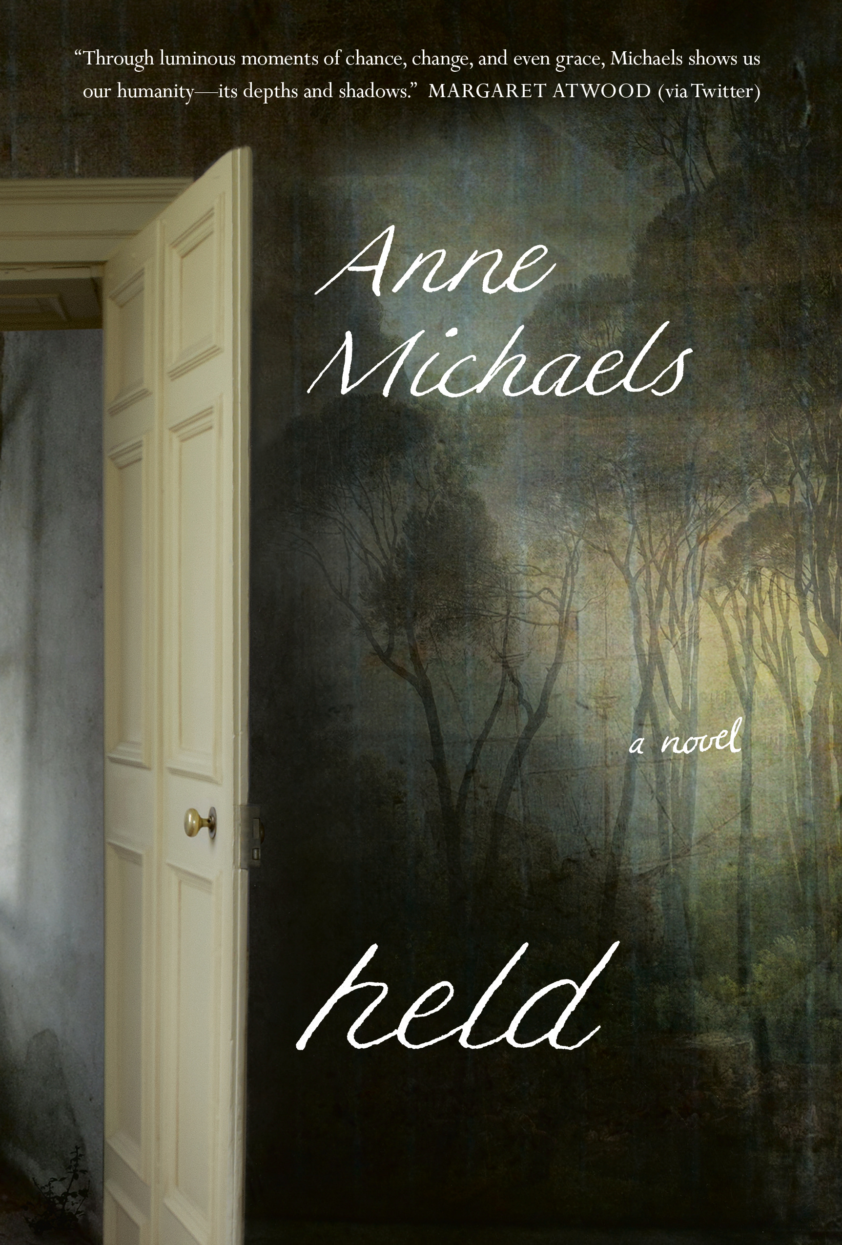 Book cover of Held by Anne Michaels.