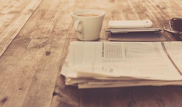 Newspaper and coffee